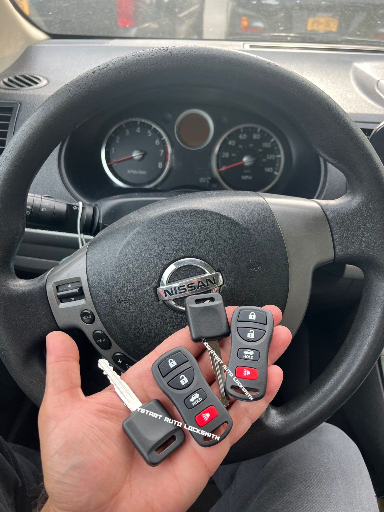 Nissan remote and car key replacement LA car locksmith Sylmar makes car key with remote