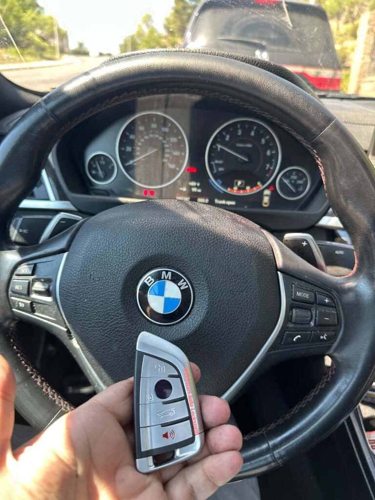 car locksmith is making a key fob replacement in Toluca Lake, Los Angeles, CA